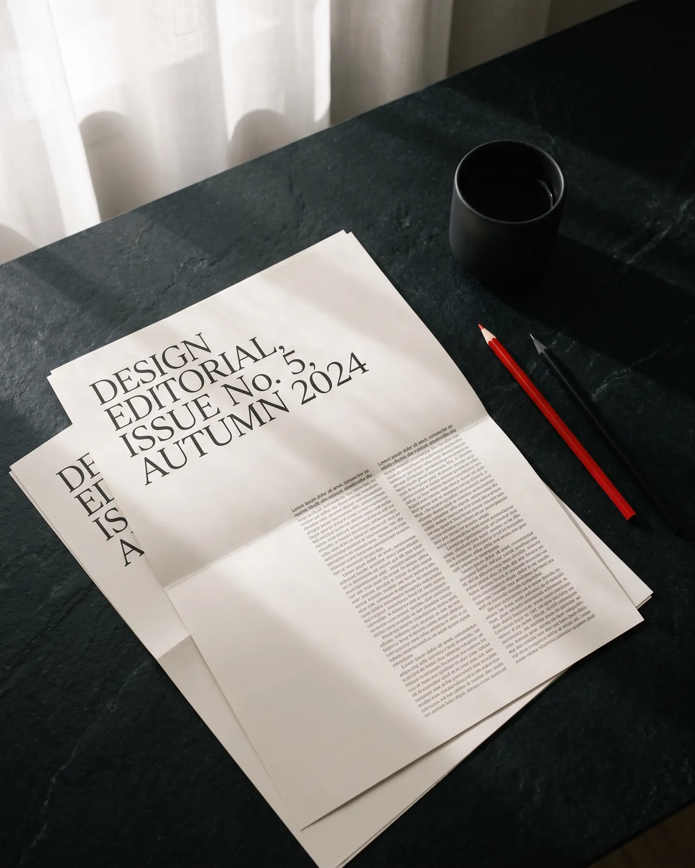 Editorial layout on black stone